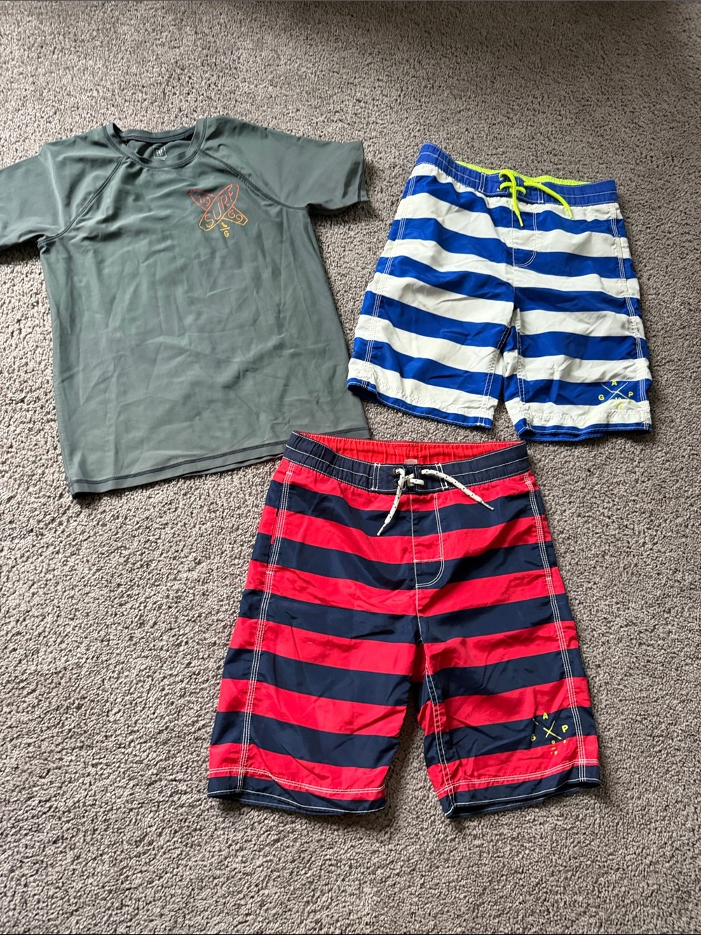 Gap Kids - one rash guard and two swim shorts. Size XL/12 boys
